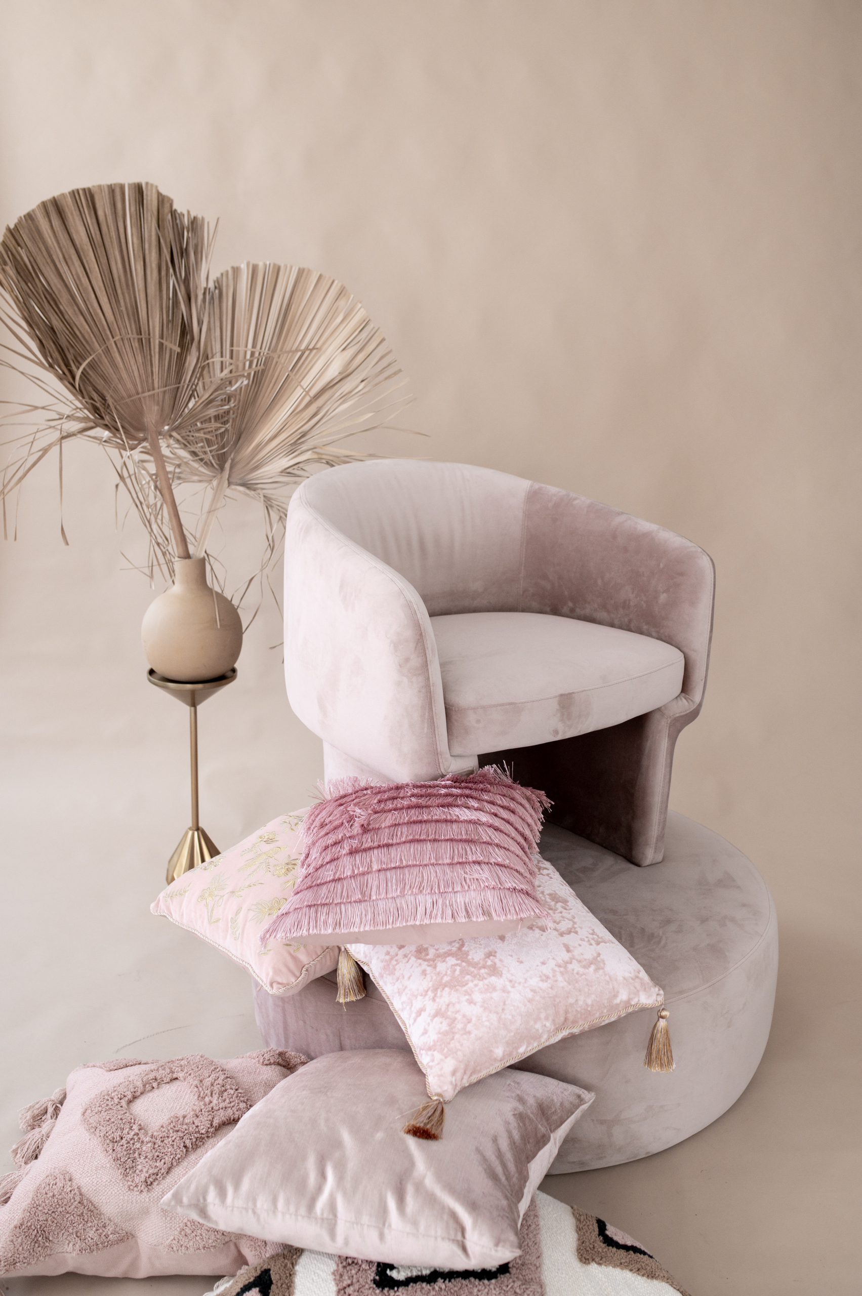 Kadeema Event furniture featuring pillow rentals in Blush Pink with Chair and ottoman