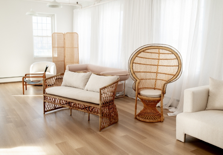 Kadeema Rentals luxury furniture rentals featuring bohemian rattan chairs and loveseat